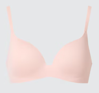 Soft blush pink seamless wireless bra with smooth cups and minimal design
